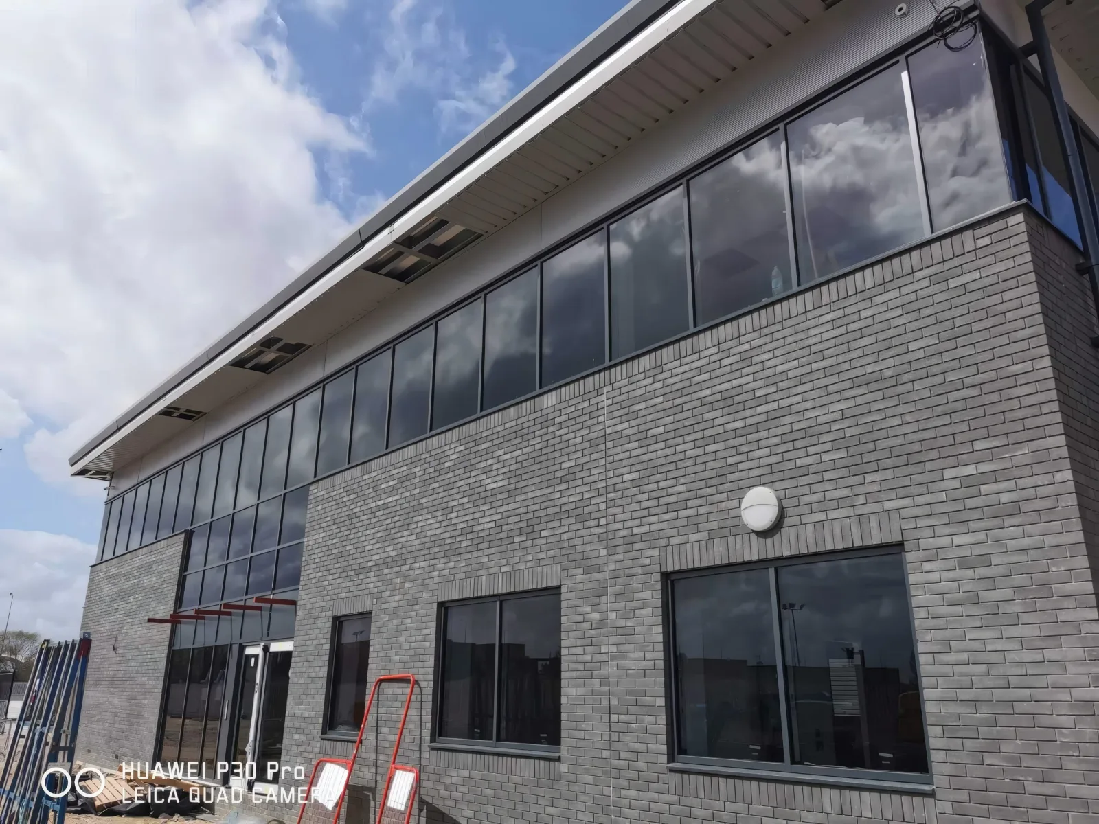 The office block’s brickwork and ribbon glazing.