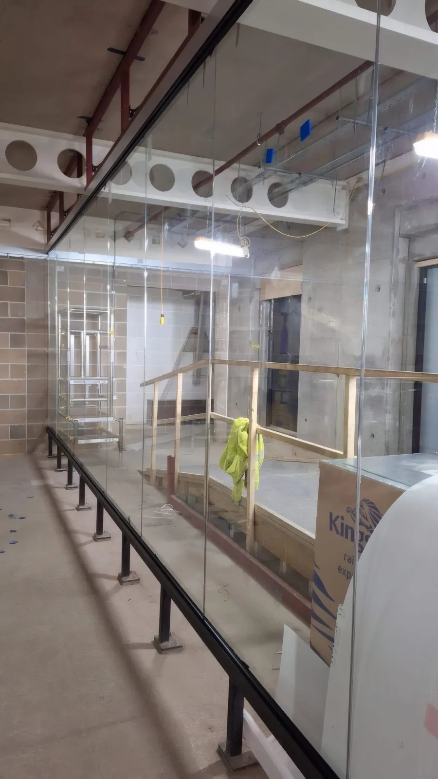 Completed glazed screen partitioning to the workspace corridor.