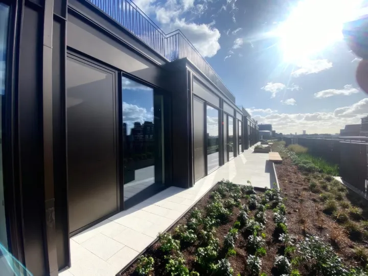 Aluminium cladding and framing to the roof terrace pavilions at Kensington High Street.