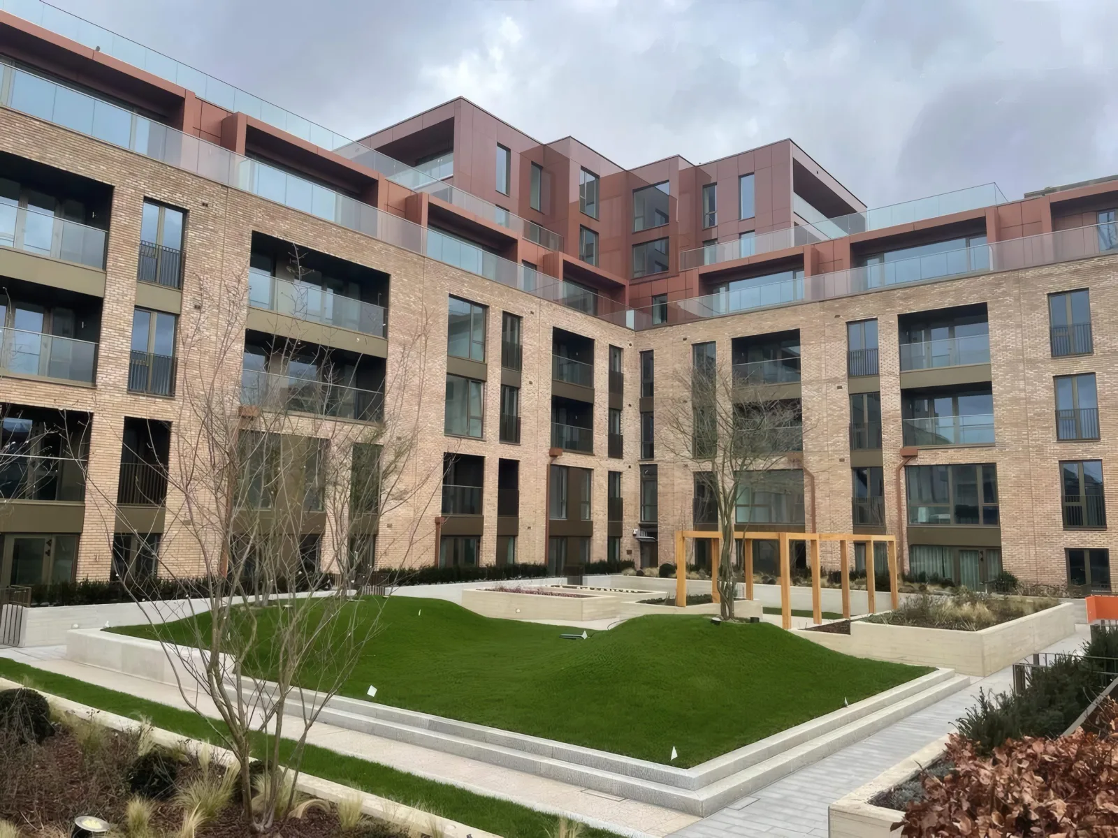The completed residential block, viewed across the landscaped courtyard.