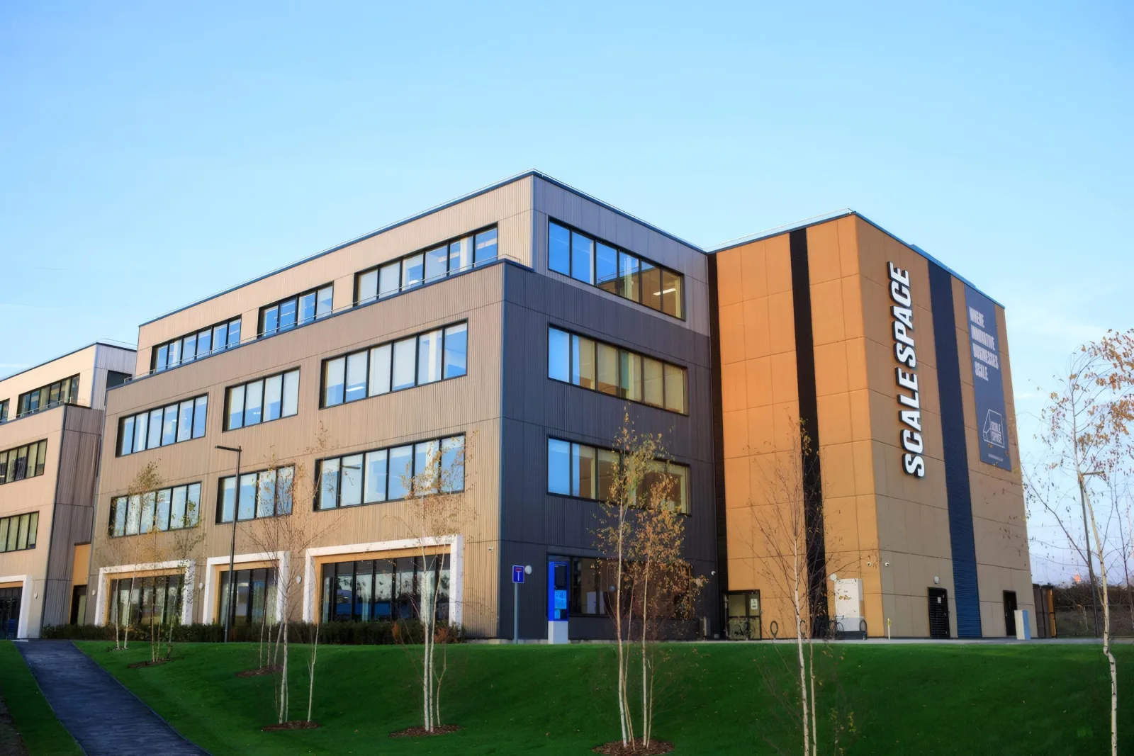 The Scale Space building, with its bronze-coloured cladding and vertical signage.
